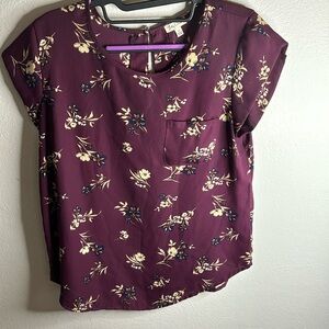 Medium chest pocket purple blouse with floral pattern